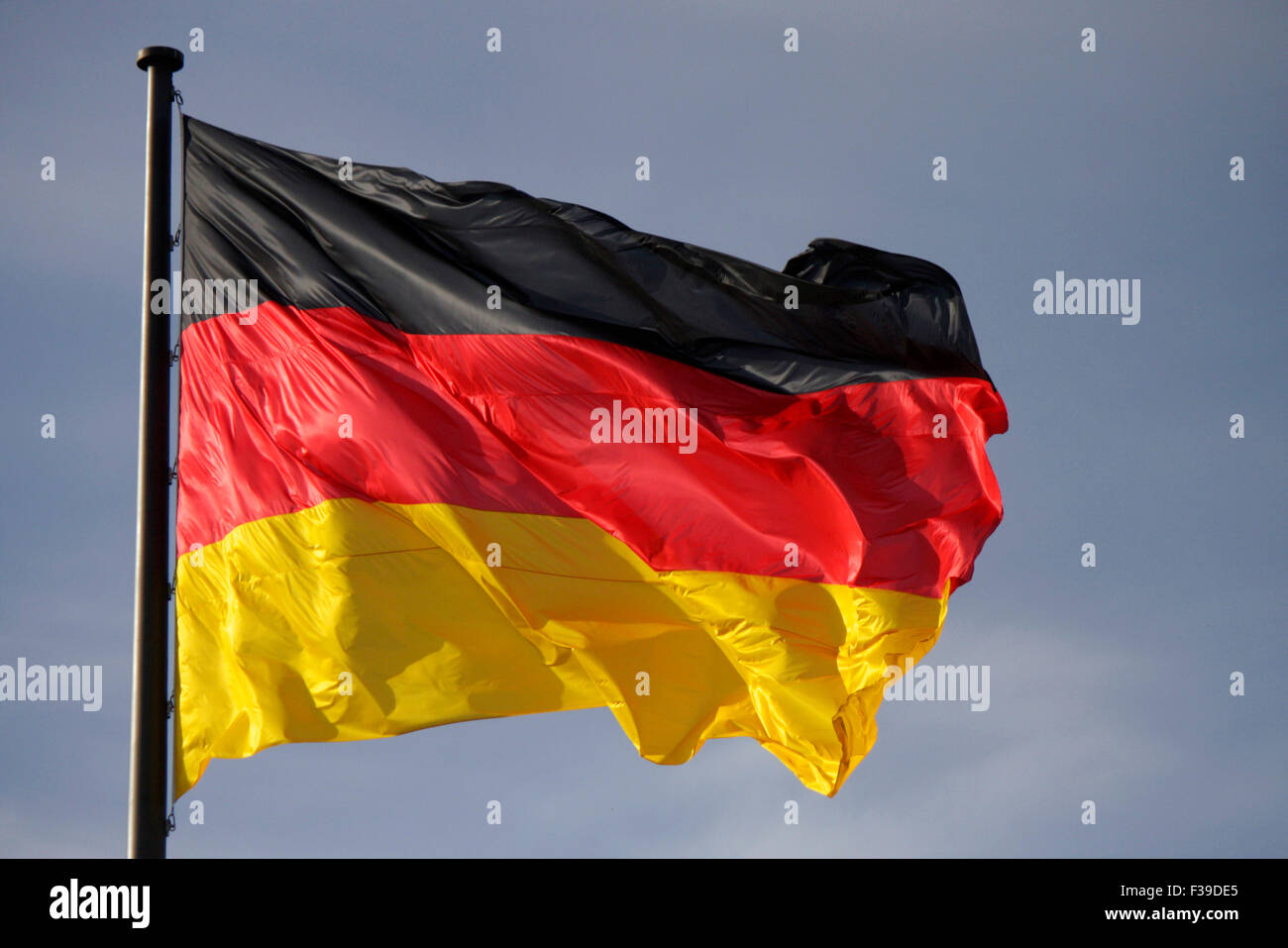 Deutschlandfahne vor Reichstag. Juni 2014, Berlin. Stock Photo