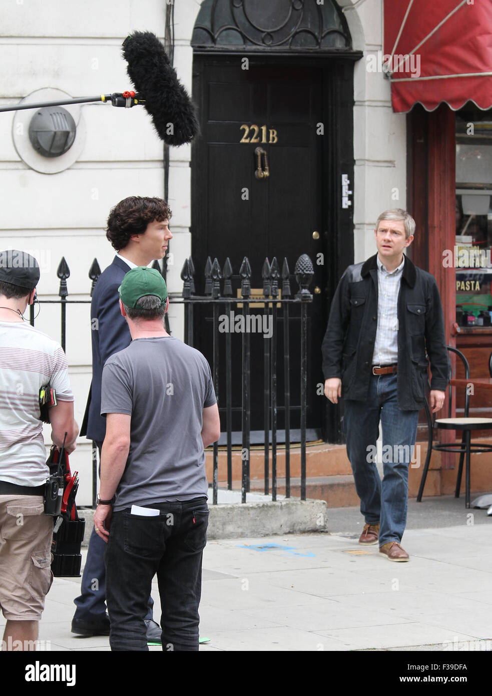 Benedict Cumberbatch and Martin Freeman seen filming scenes for  Sherlock in London Stock Photo