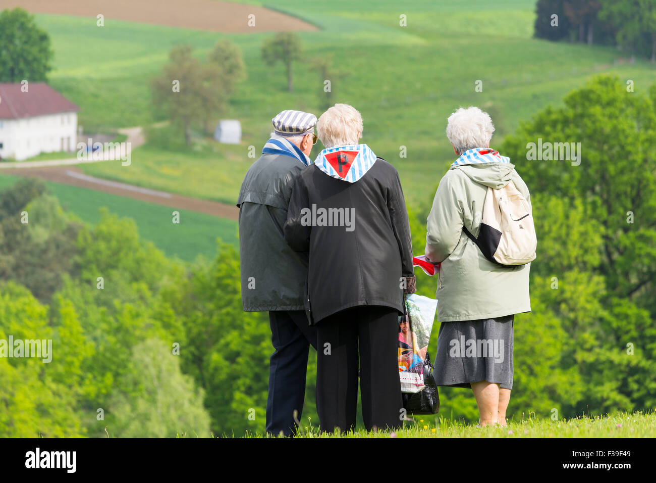 Mauthausen, Austria-May 10.2015: ex deportee observes the landscape around the camp of Mauthausen where he was imprisoned more t Stock Photo
