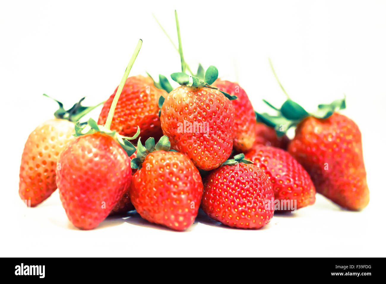 Strawberry berries on a white background Stock Photo - Alamy