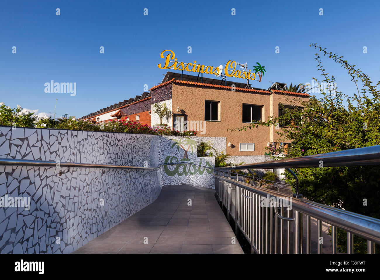 Disabled ramp access to the swimming pool area Oasis in Los Gigantes, canary Islands, Spain. Stock Photo