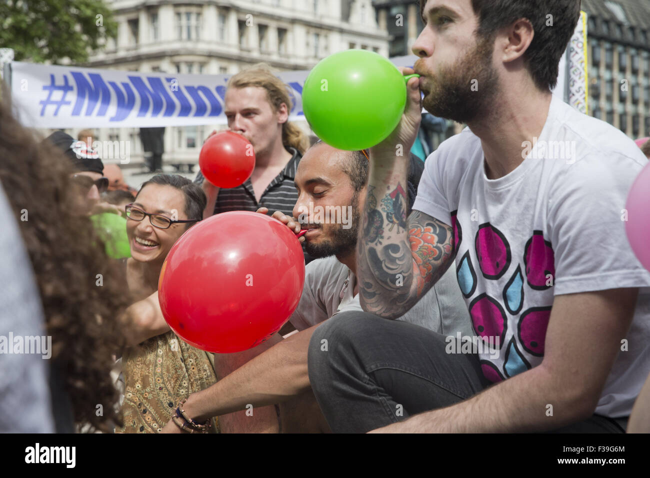 Protesters gather in Parliament Square for a mass inhalation of nitrous