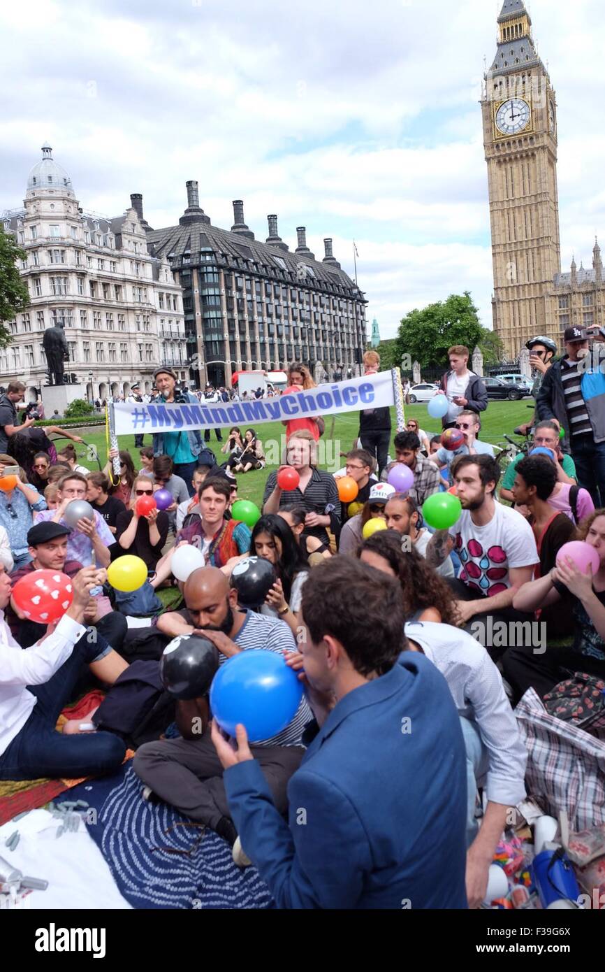 Protesters gather in Parliament Square for a mass inhalation of nitrous
