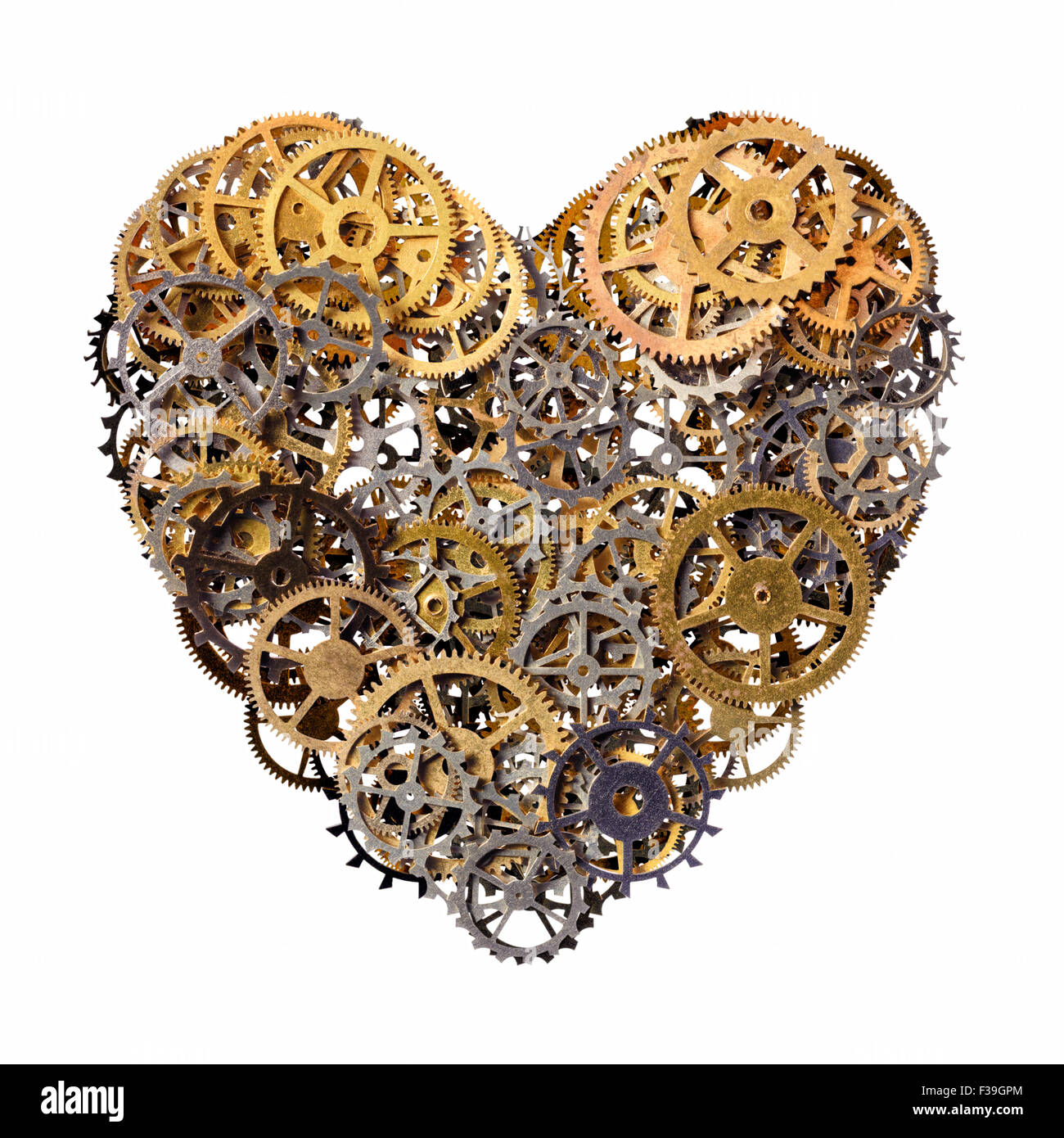 Isolated objects: heart shape made of metal pinions and sprockets, isolated on white background. Technical abstract for Valentin Stock Photo