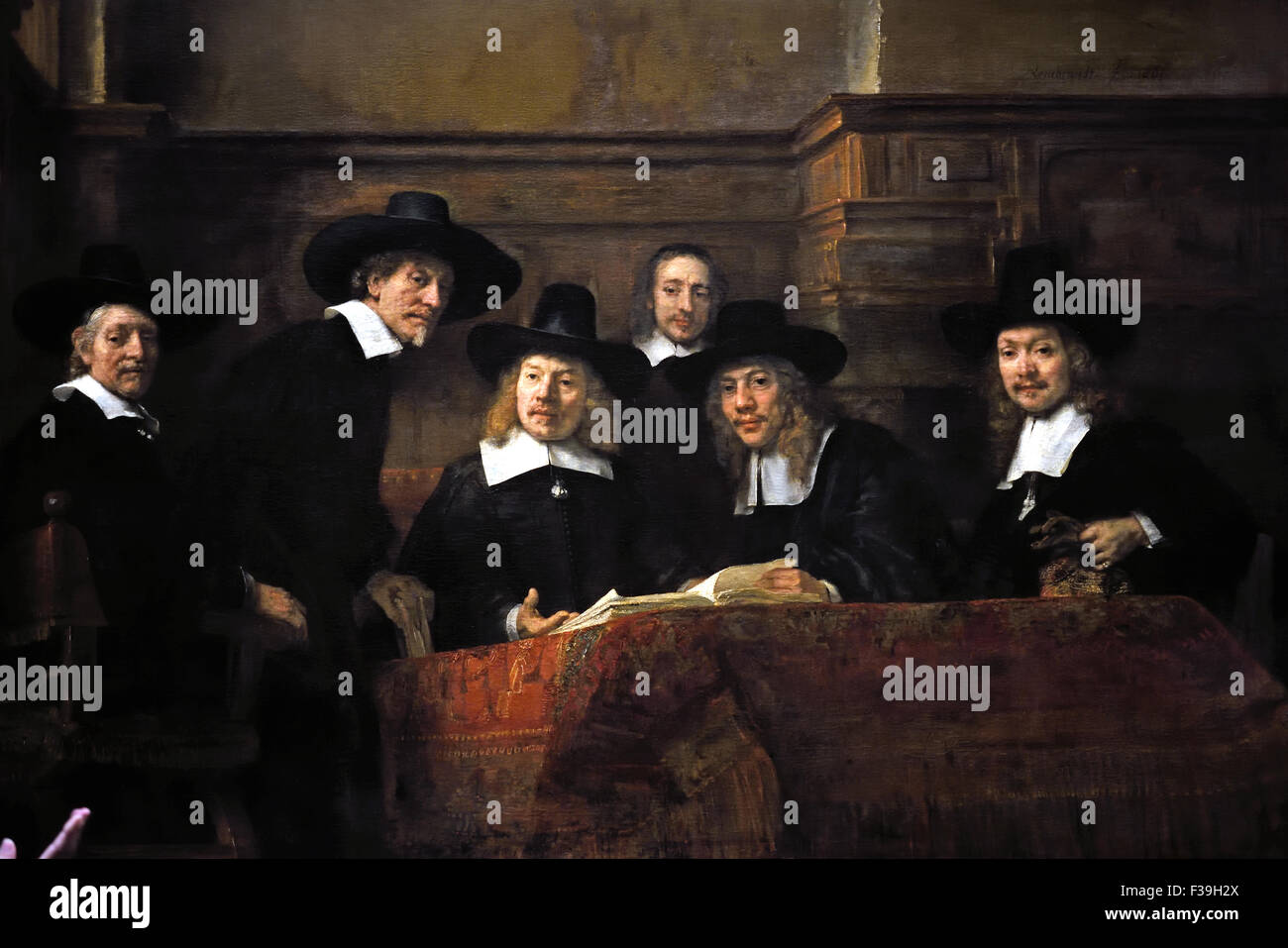 The syndics of the Amsterdam draper's guild ( De Staalmeesters ) Rembrandt Harmenszoon van Rijn Dutch 1606–1669 Netherlands Stock Photo