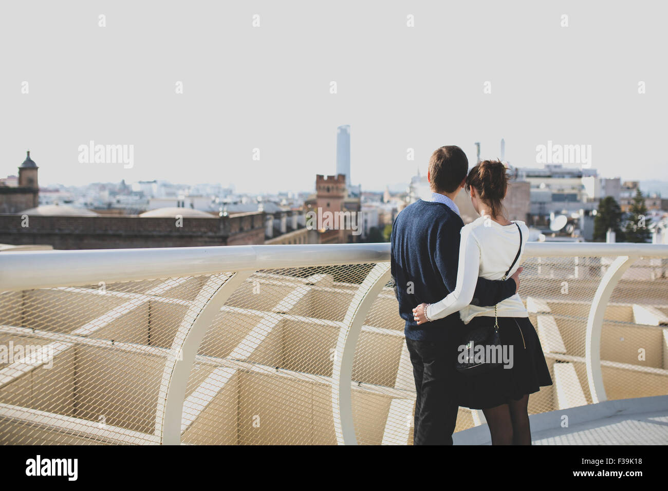 Portrait of a young couple looking at city views, Seville, Andalusia, Spain Stock Photo