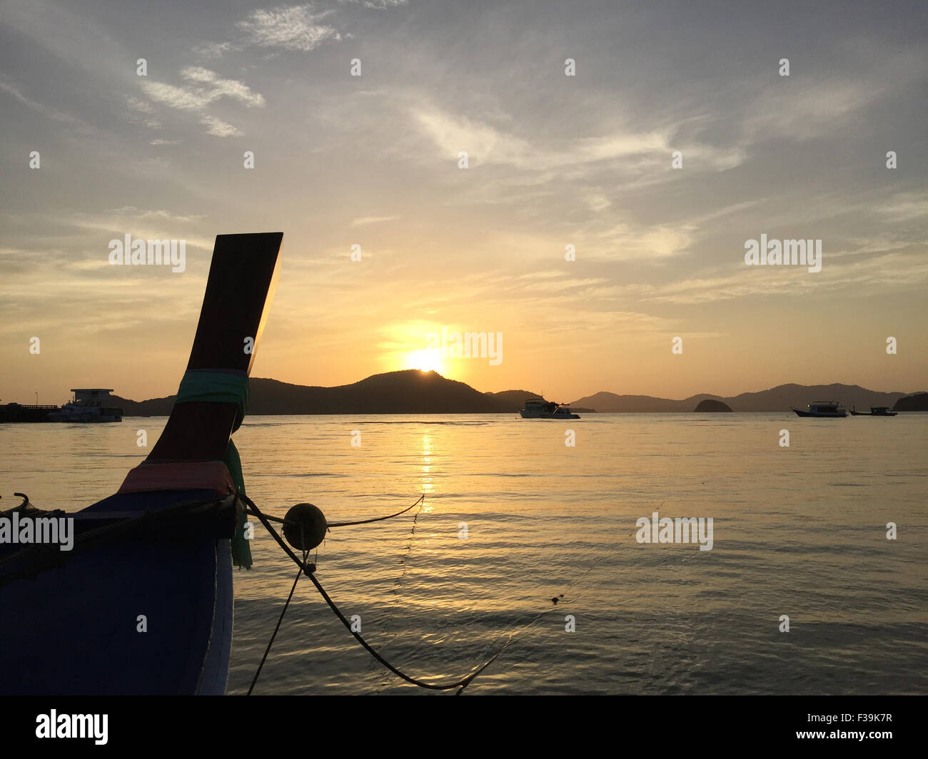 Group fishing boat sunset hi-res stock photography and images - Alamy