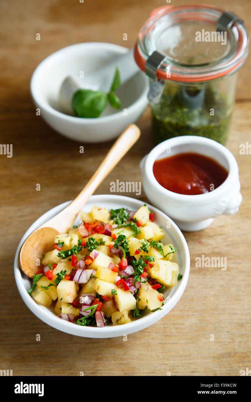 Assorted sauces on wooden background Stock Photo