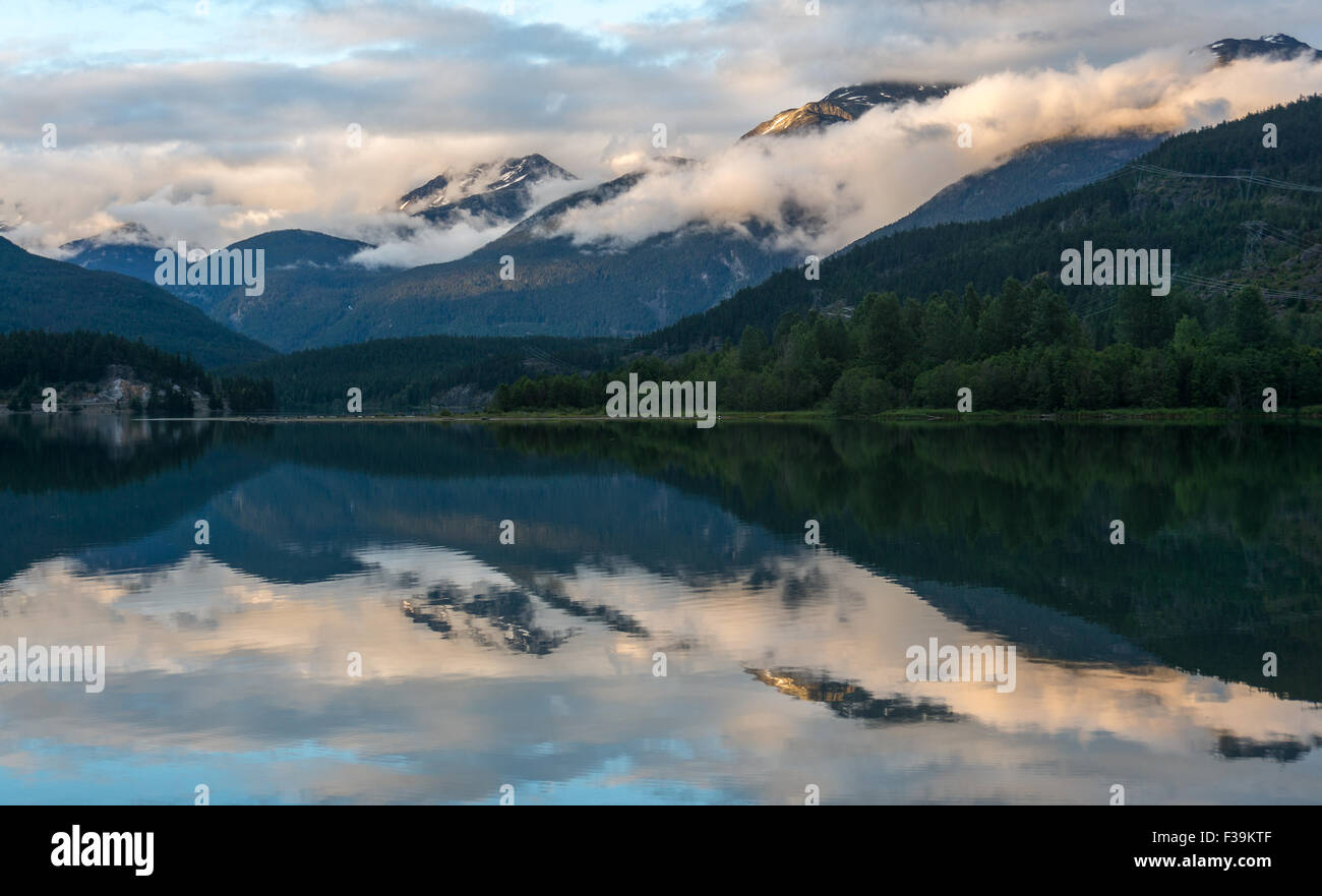 Mountain reflection in green Lake, Whistler, British Columbia, Canada Stock Photo