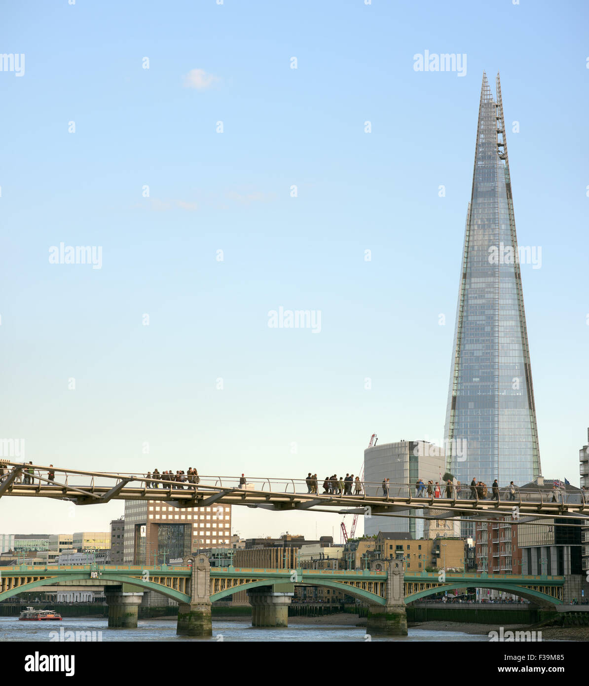 Millennium bridge, London, one of the iconic buildings that line the banks of the river Thames in London. Stock Photo