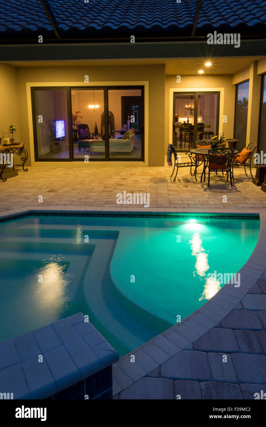 Swimming pool and back veranda of typical Florida Home, Naples, Florida