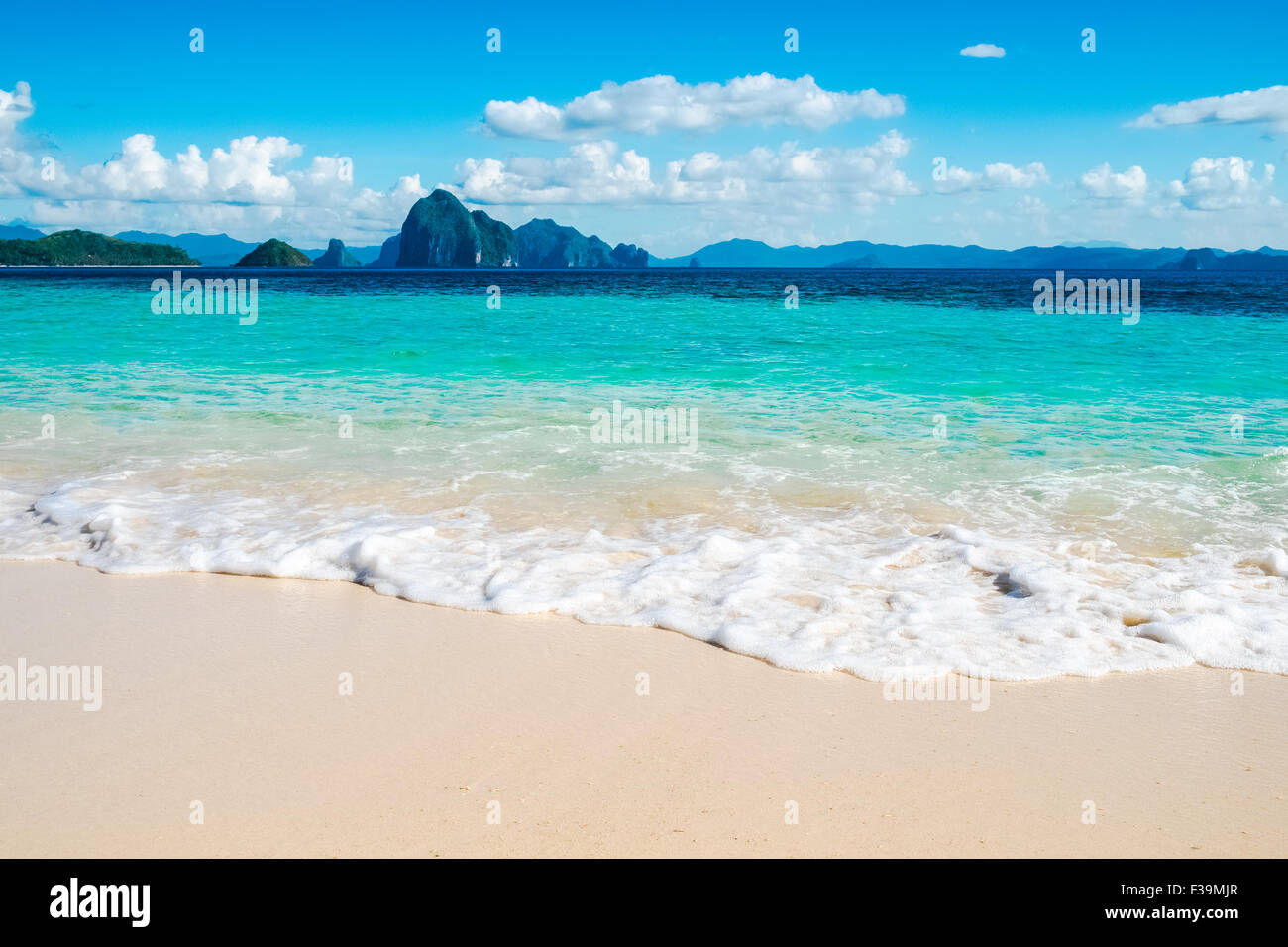 Beautiful blue sea wave on white sand beach Stock Photo