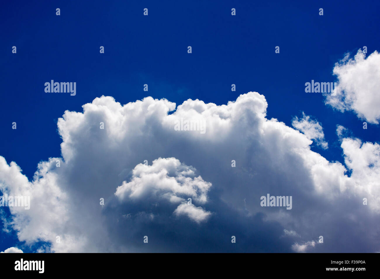 Cloudy blue sky background Stock Photo - Alamy