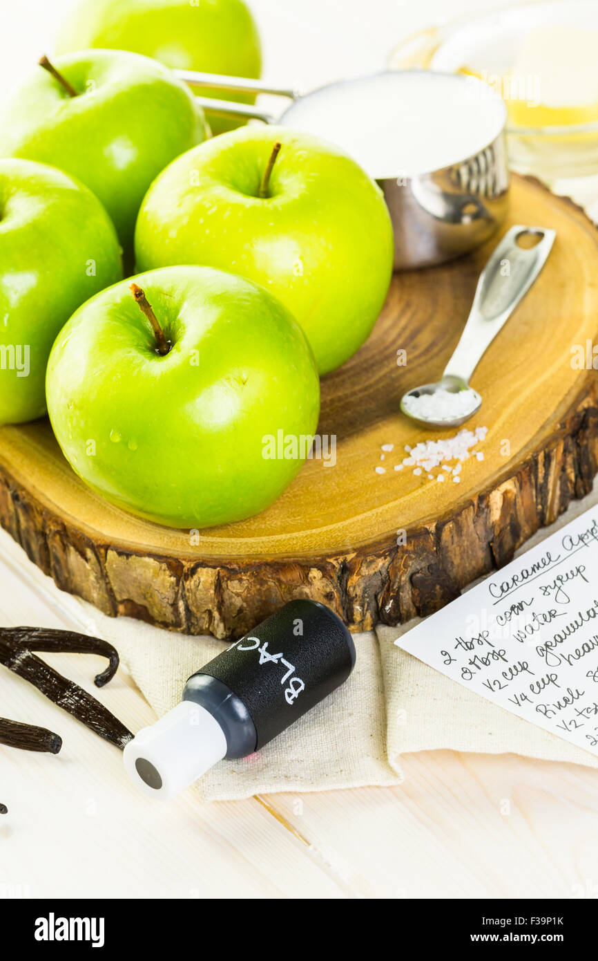 Ingredients for preparing homemade black candy apples Stock Photo Alamy