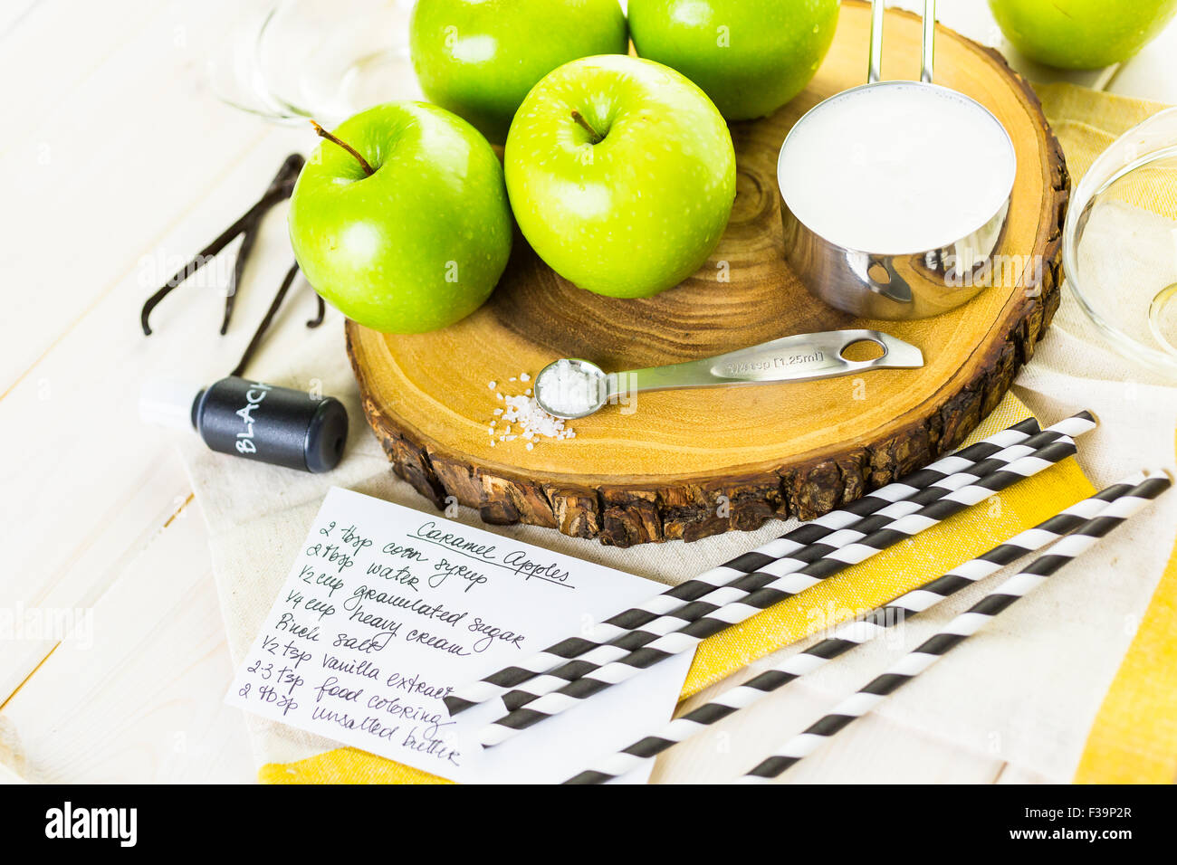 Ingredients for preparing homemade black candy apples Stock Photo Alamy