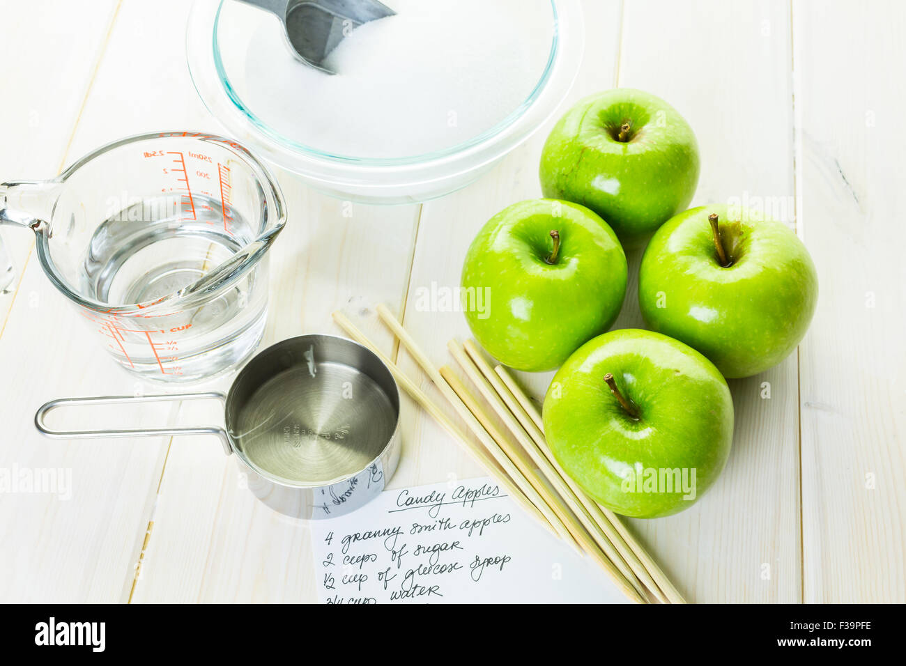 Ingredients for preparing homemade black candy apples Stock Photo Alamy