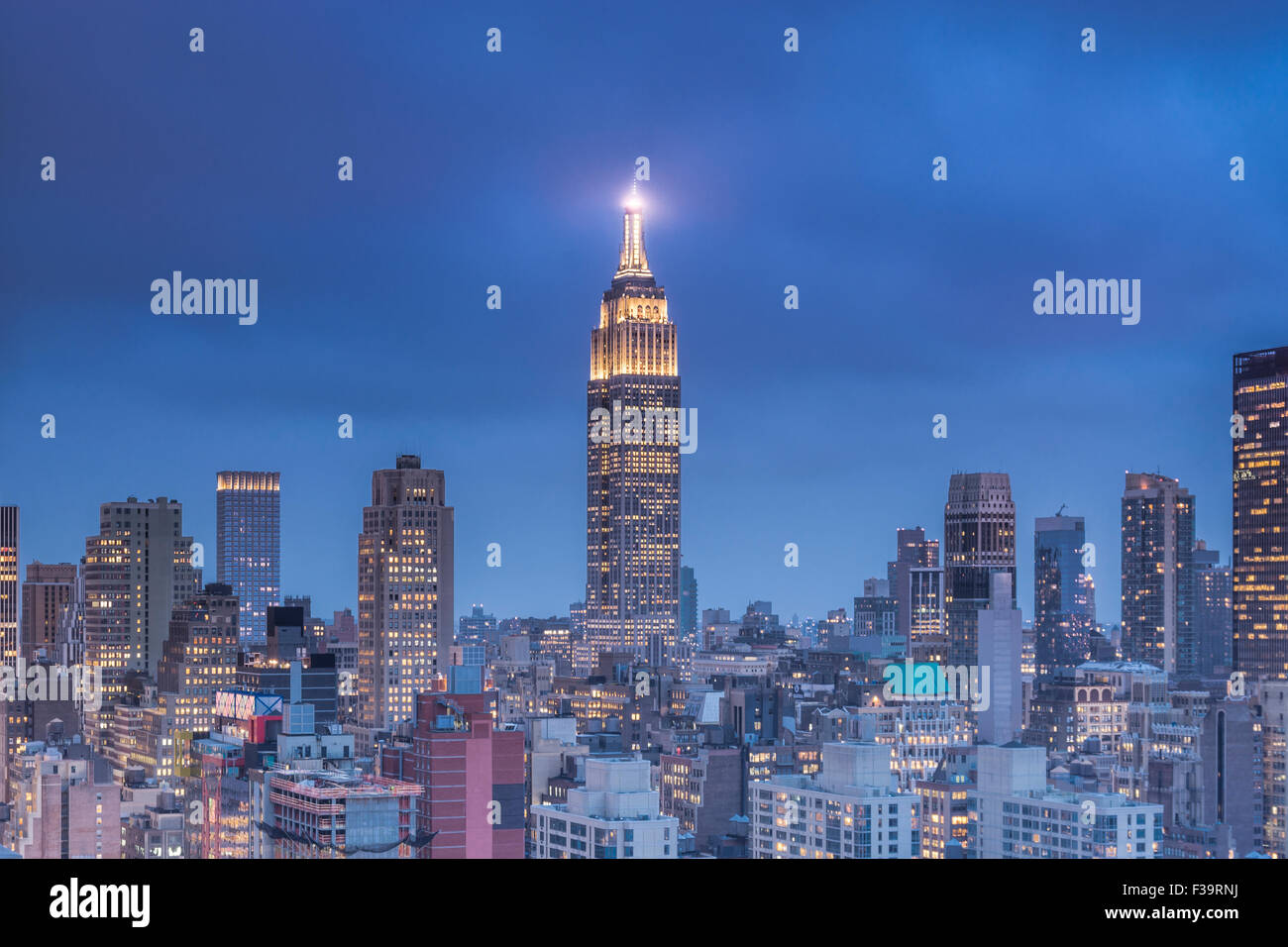 View of The Empire State Building at dusk from 42th avenue in Manhattan. Stock Photo
