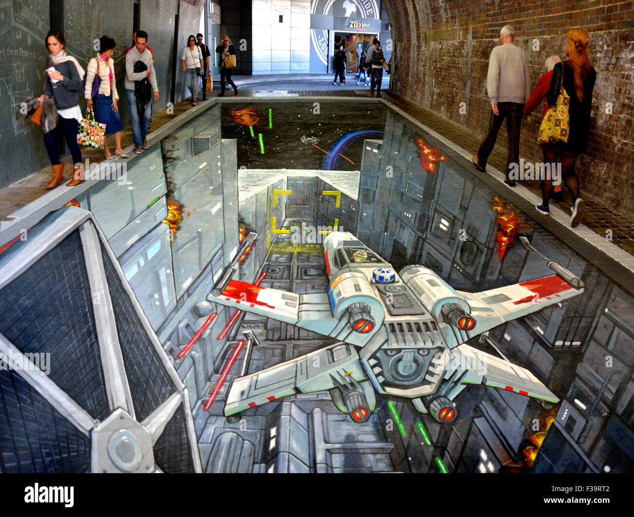 London, UK. 2nd October, 2015. 3D pavement art, created by 3D artists Joe and Max, depicting a scene from 'Star Wars: Episode IV A New Hope',  to celebrate the UK launch of the Rise Against The Empire play set, Credit:  PjrNews/Alamy Live News Stock Photo