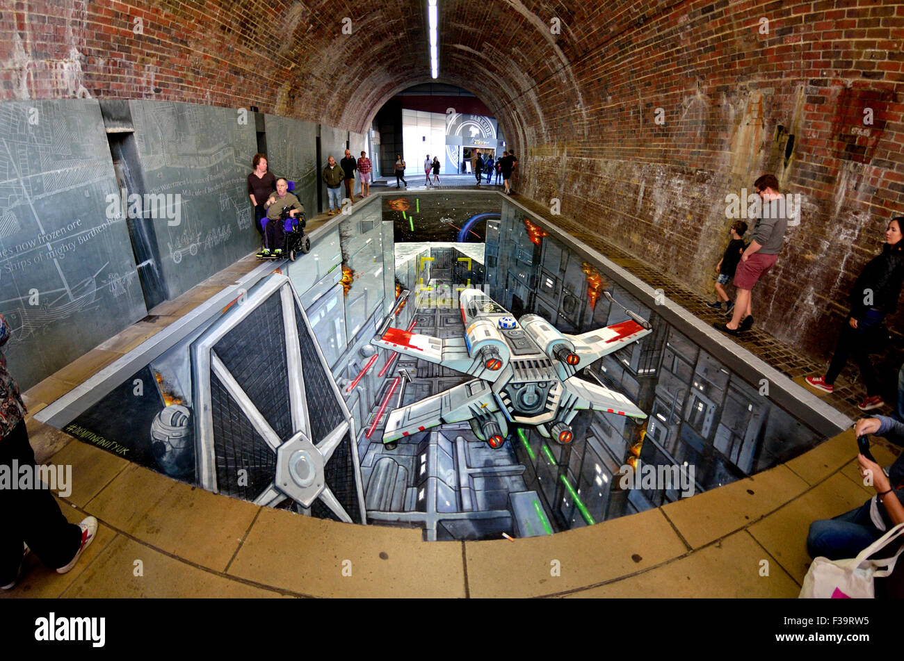London, UK. 2nd October, 2015. 3D pavement art, created by 3D artists Joe and Max, depicting a scene from 'Star Wars: Episode IV A New Hope',  to celebrate the UK launch of the Rise Against The Empire play set, Credit:  PjrNews/Alamy Live News Stock Photo