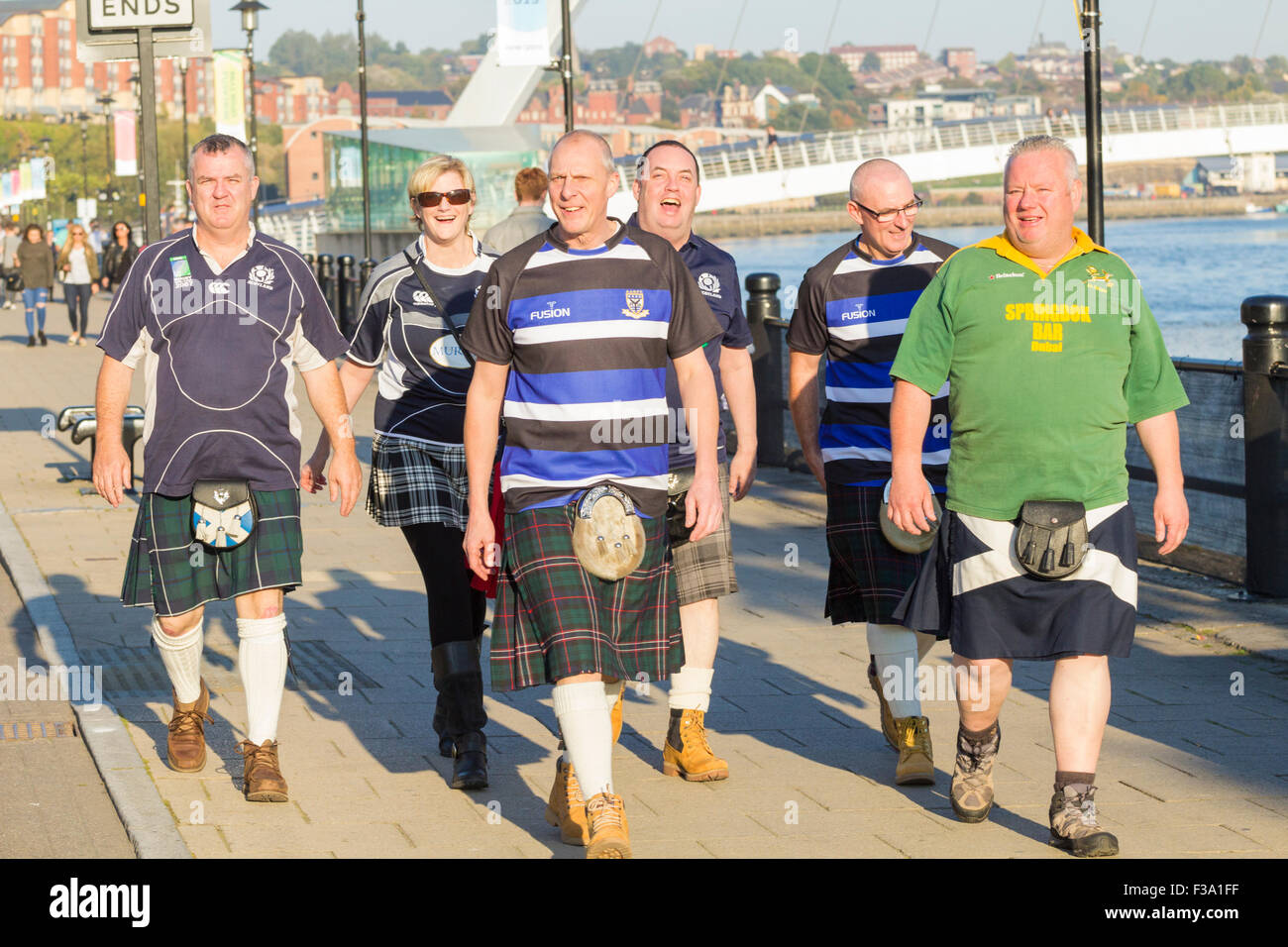 Newcastle, UK. 2nd October, 2015. Weather: Scotland fans in Kilts taking a stroll along The Quayside on a glorious Friday in Newcastle. Thousand of Scotland fans are expected in Newcastle on Saturday for Scotland`s match against South Africa. Credit:  Alan Dawson News/Alamy Live News Stock Photo