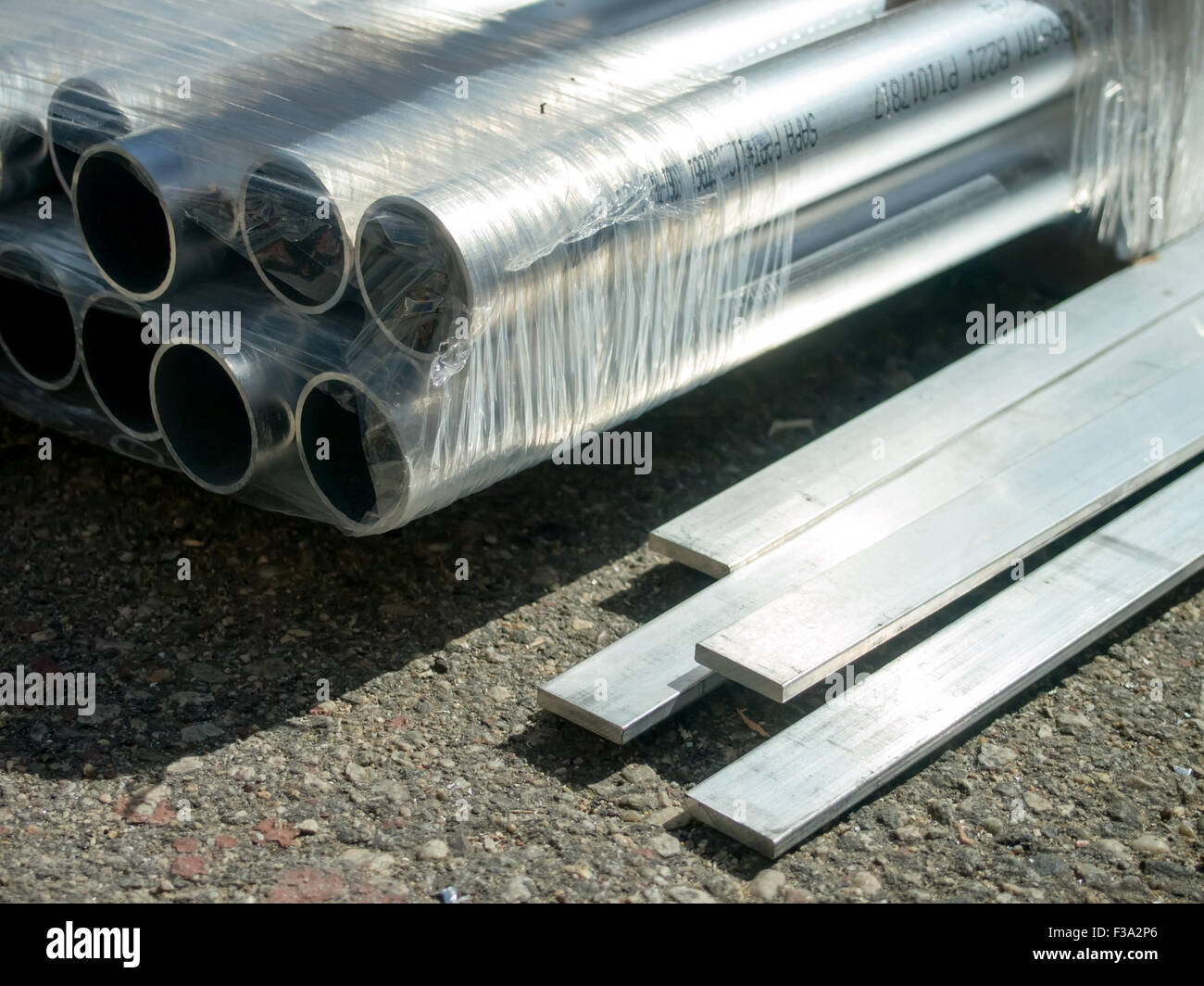 Stack of Many Pipes at the Construction Site Stock Photo - Alamy