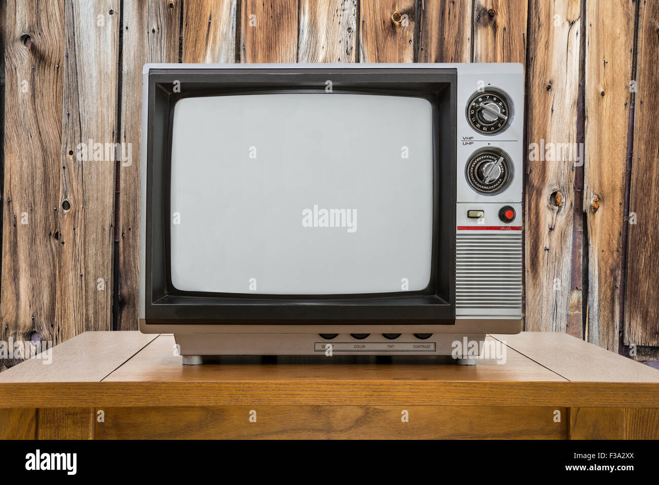 Vintage portable television and table with rustic cabin wall Stock ...