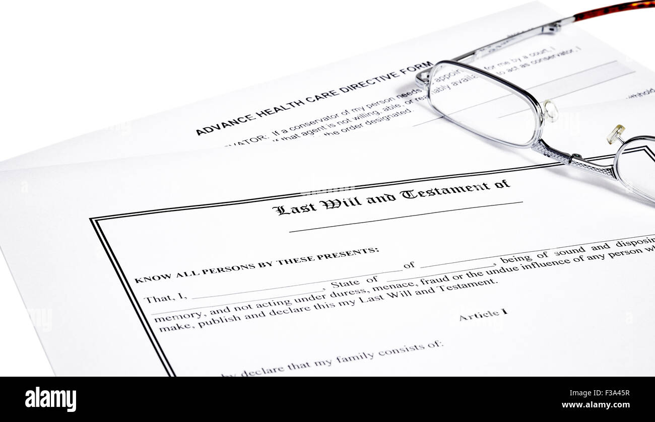 Last will and testament with medical directive form and reading glasses isolated on white Stock Photo