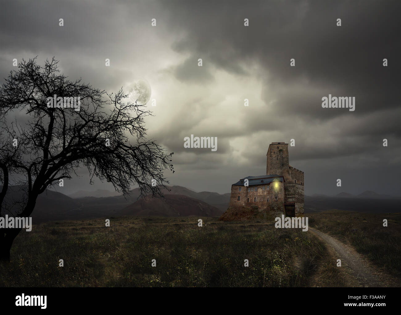 Apocalyptic Halloween scenery with old house pumpkin Stock Photo