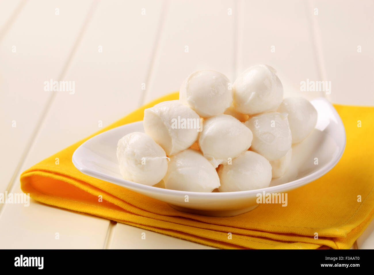 Bowl of small mozzarella cheese balls Stock Photo Alamy