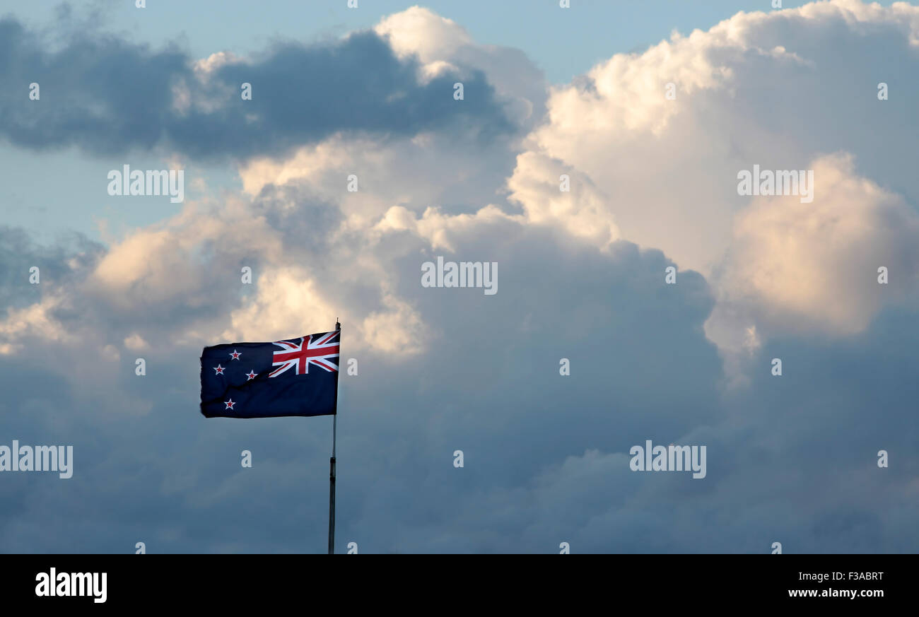 New Zealand Flag with storm clouds at Whangamata, Coromandel Peninsula, New Zealand Stock Photo