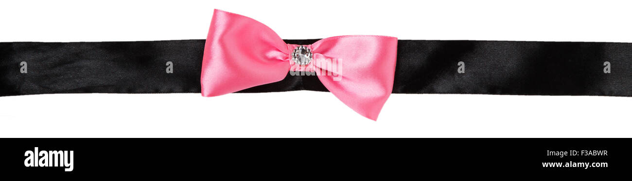 Pink bow on a black ribbon isolated on white background Stock Photo - Alamy