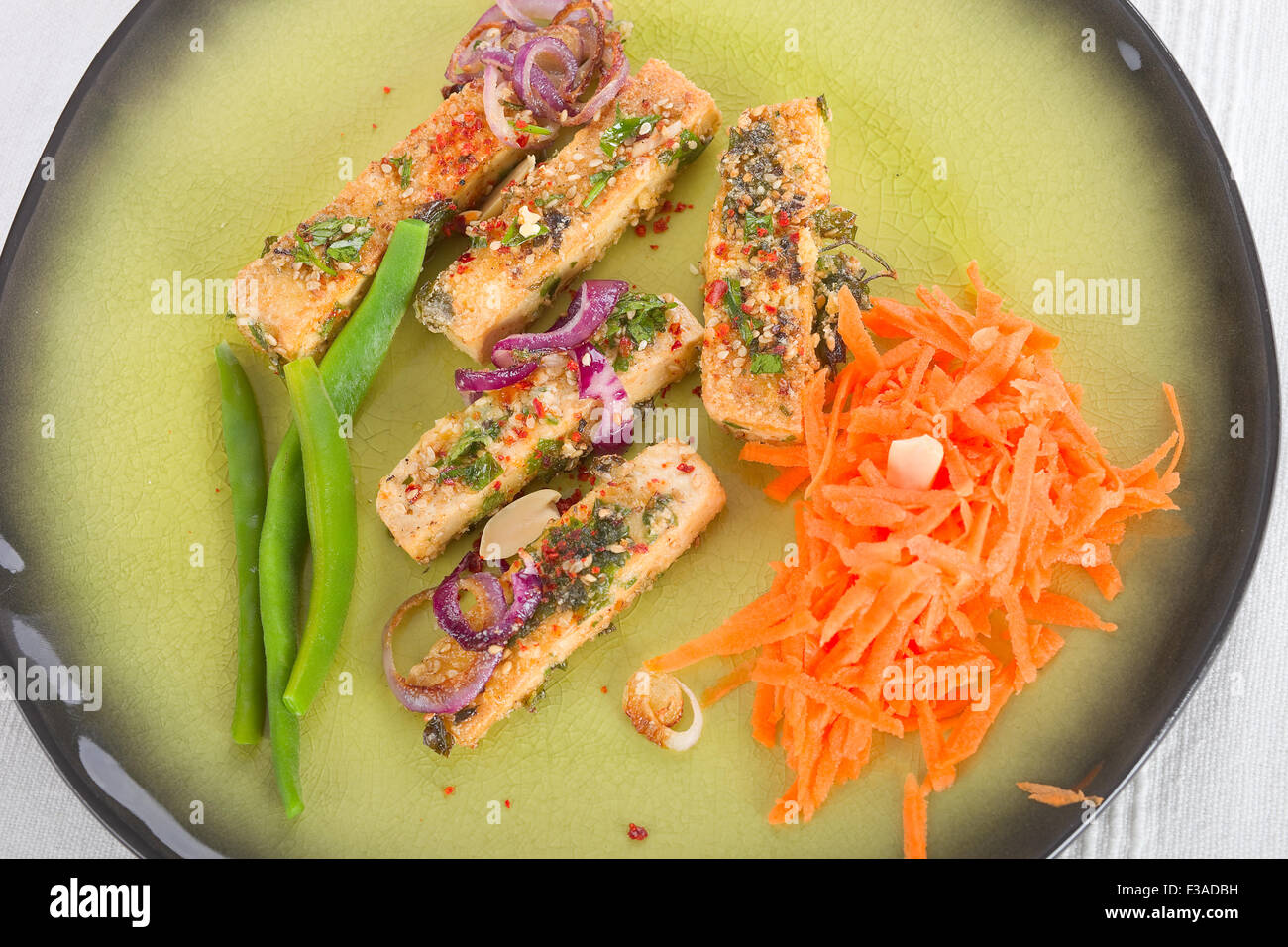 Tofu with vegetables Stock Photo - Alamy