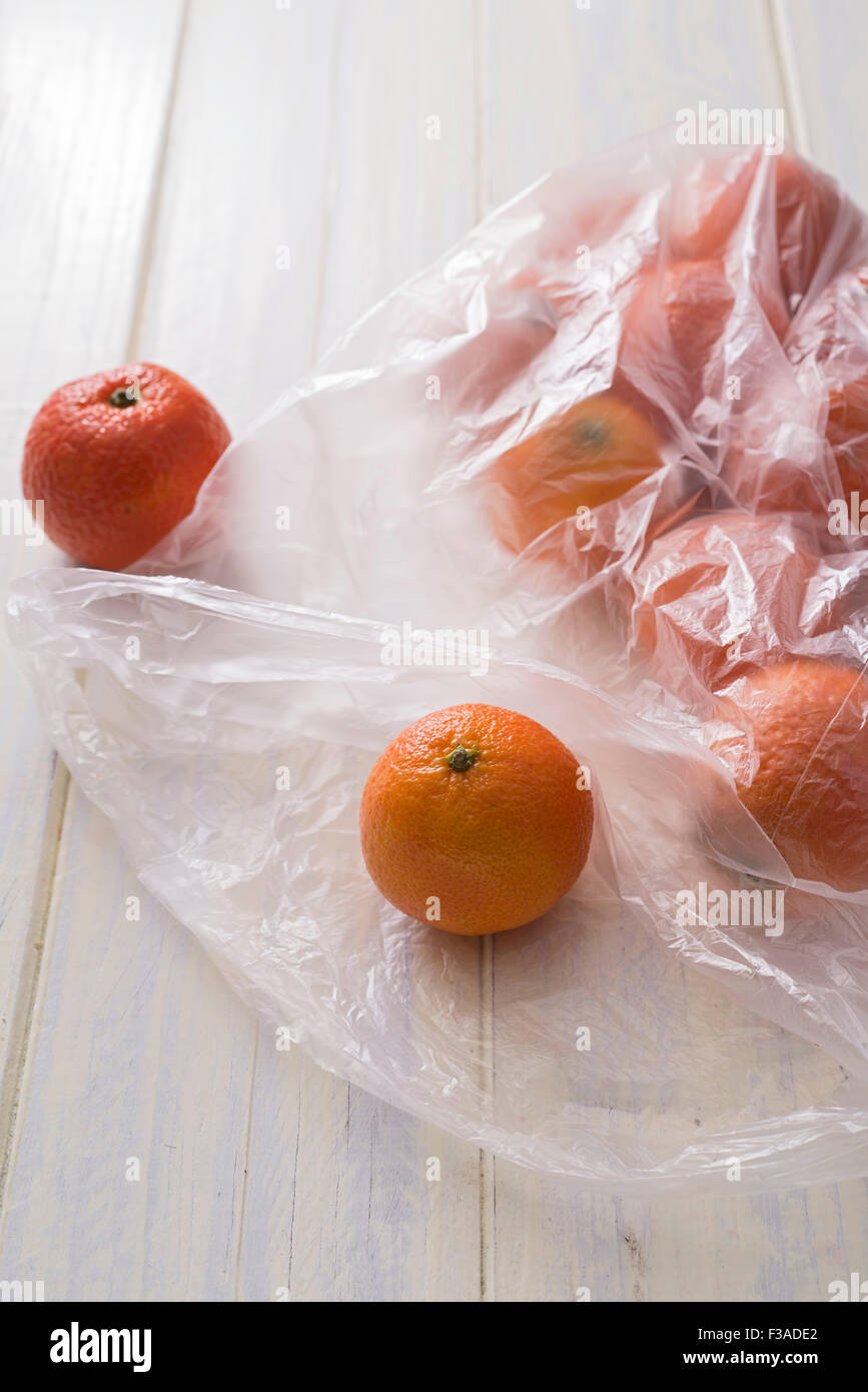 mandarin oranges in a plastic bag Stock Photo Alamy