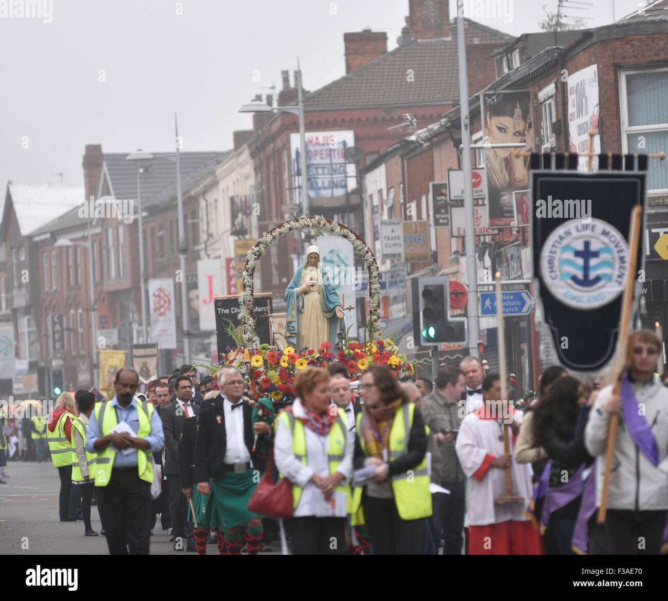 Manchester UK 3rd October 2015 Roman Catholics walk through south