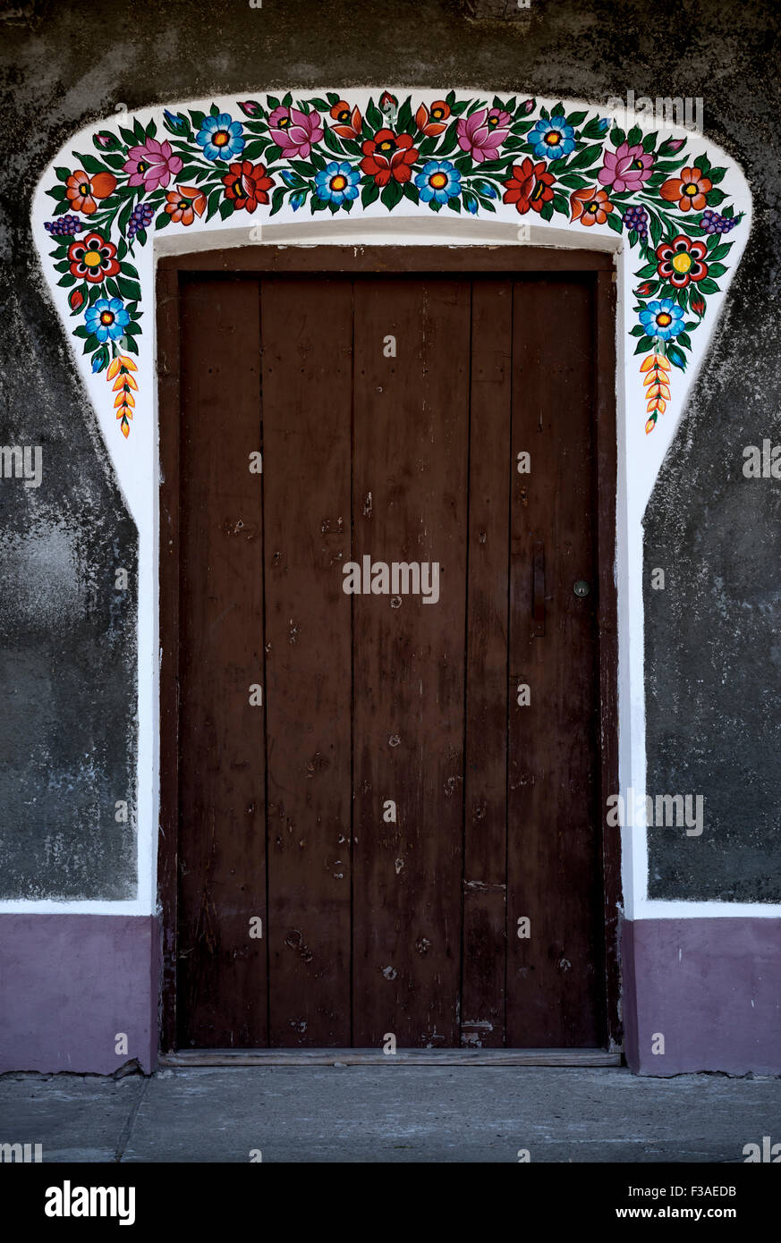 Floral decorations on the facade of a typical wooden house in the village of Zalipie in poland Stock Photo