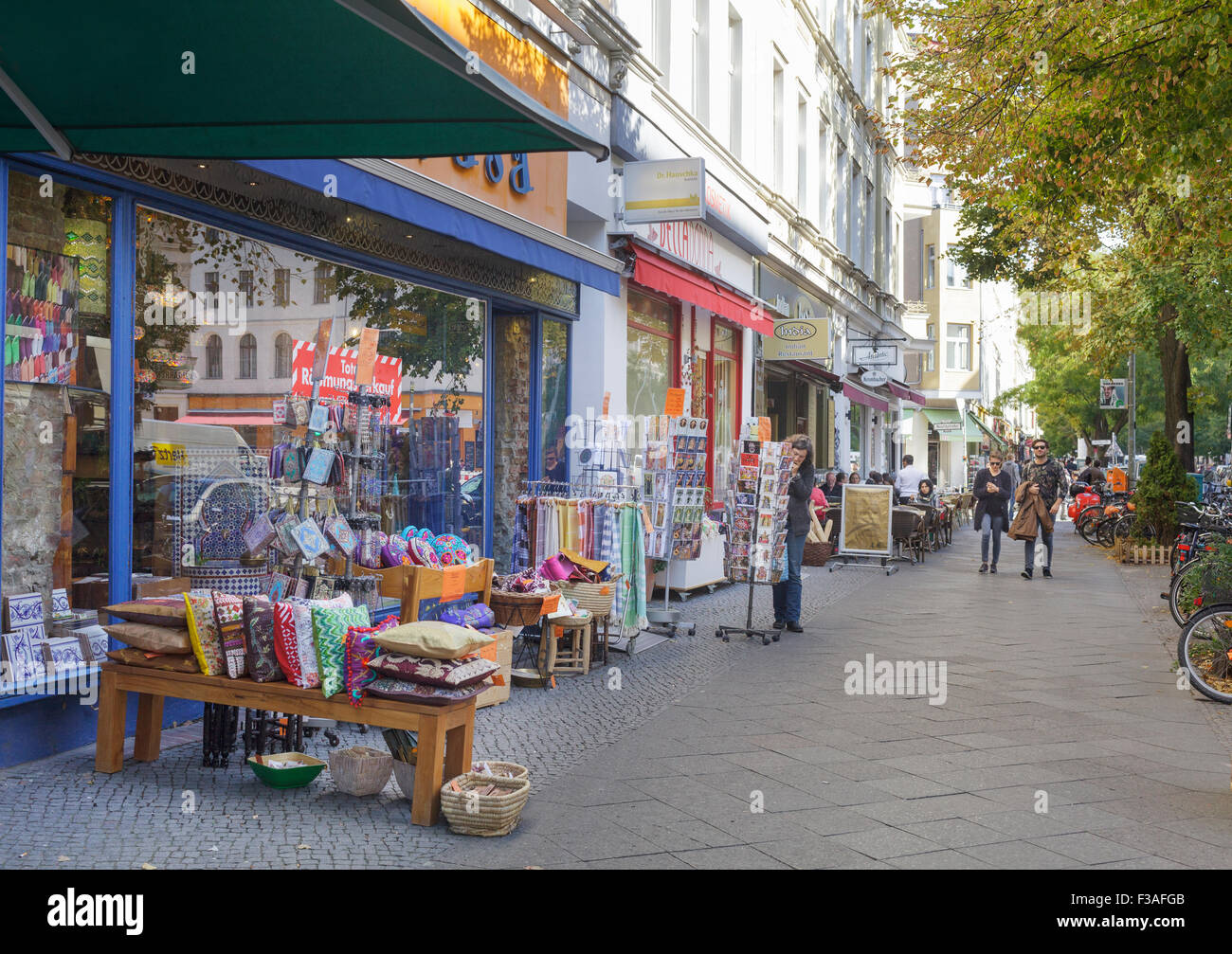 Colourful shops and restaurants on Bergmannstrasse in Kreuzberg, Berlin, Germany Stock Photo