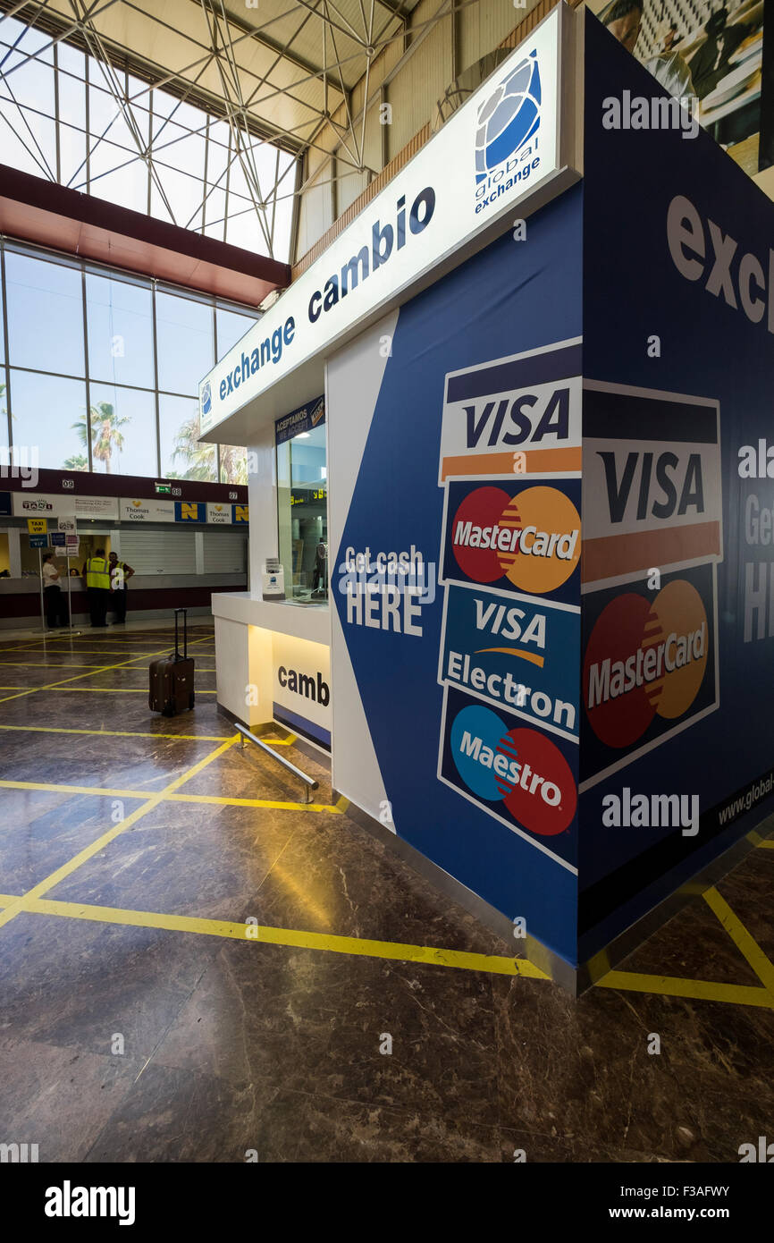 Booth offering currency exchange service in the arrivals hall at Tenerife south airport. Canary Islands, Spain. Stock Photo