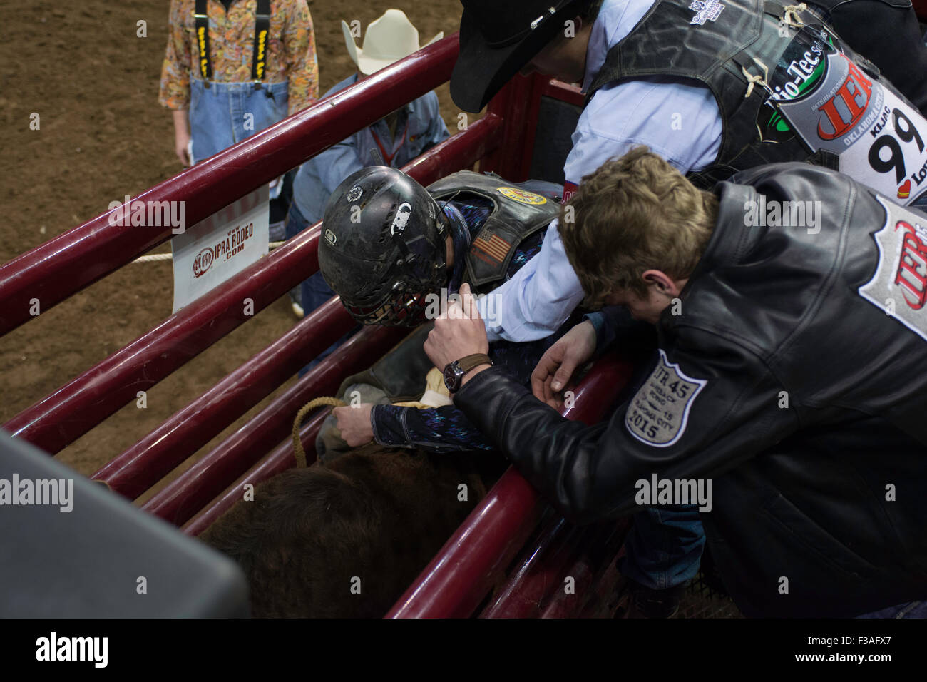 Cowboy falling off bull hi-res stock photography and images - Alamy