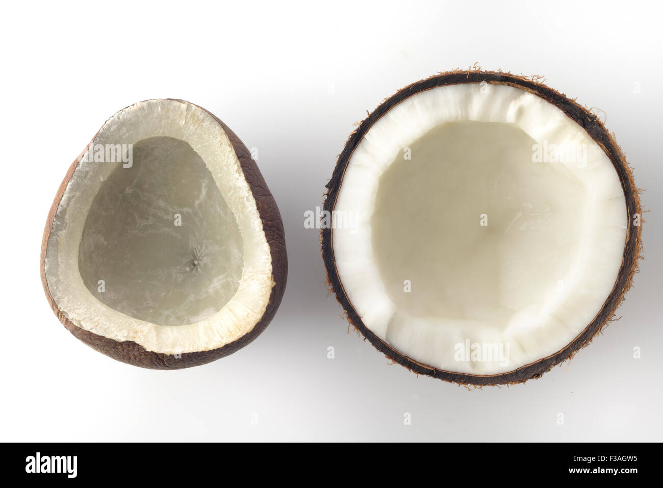 Fresh and Dried Halved Coconuts Stock Photo Alamy
