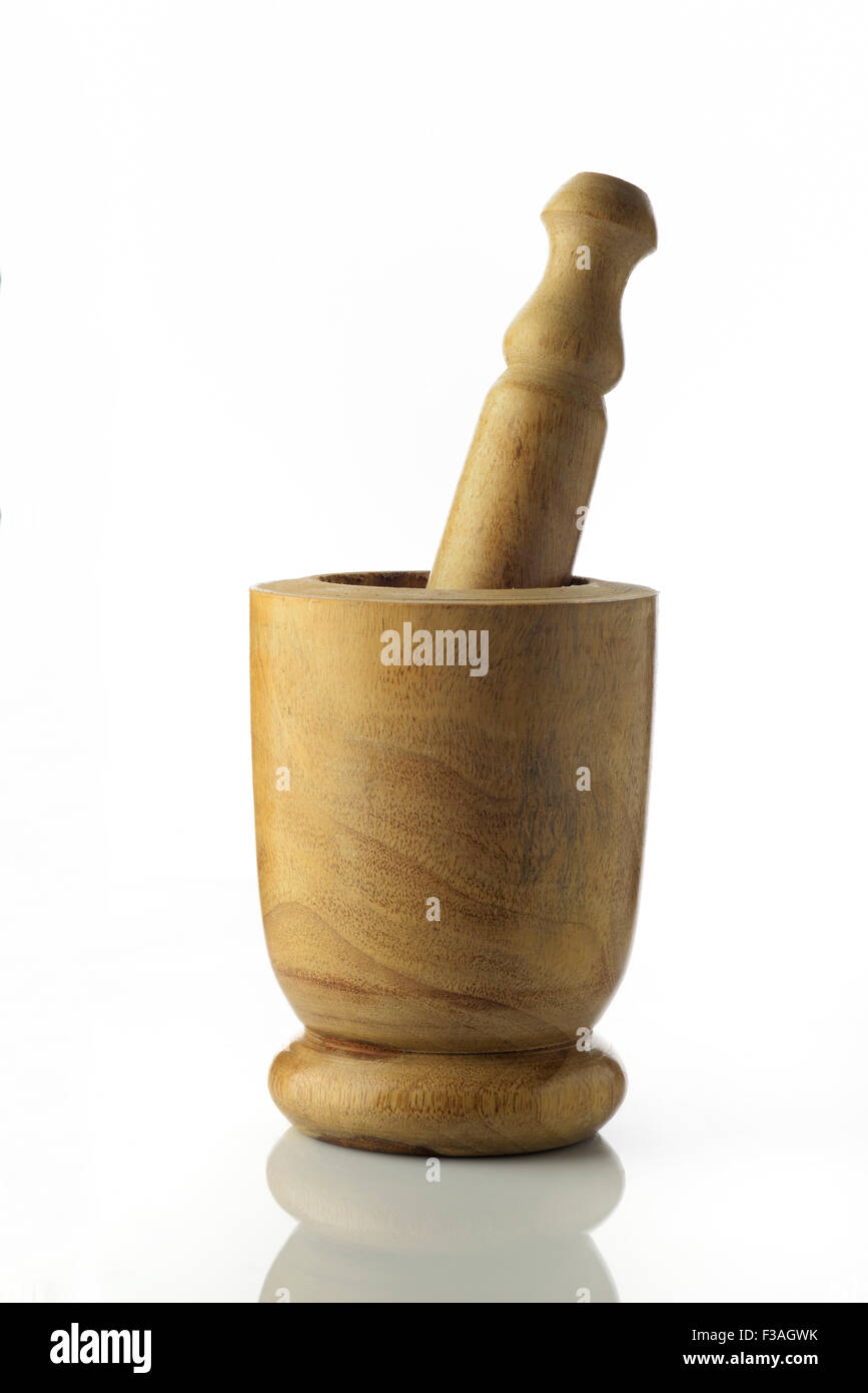 Light Brown Wooden Mortar and Pestle on White Background Stock Photo