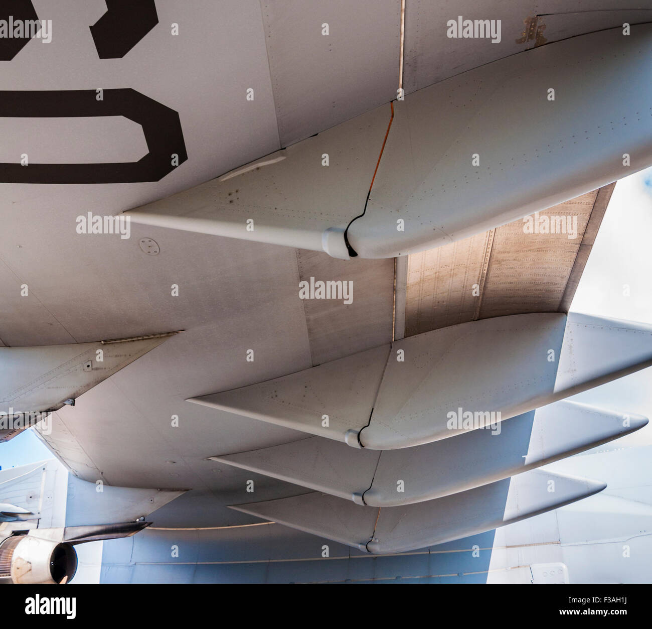 Close-up view of the flap track fairings beneath the port wing of a McDonnell Douglas/Boeing C-17 Globemaster III Stock Photo