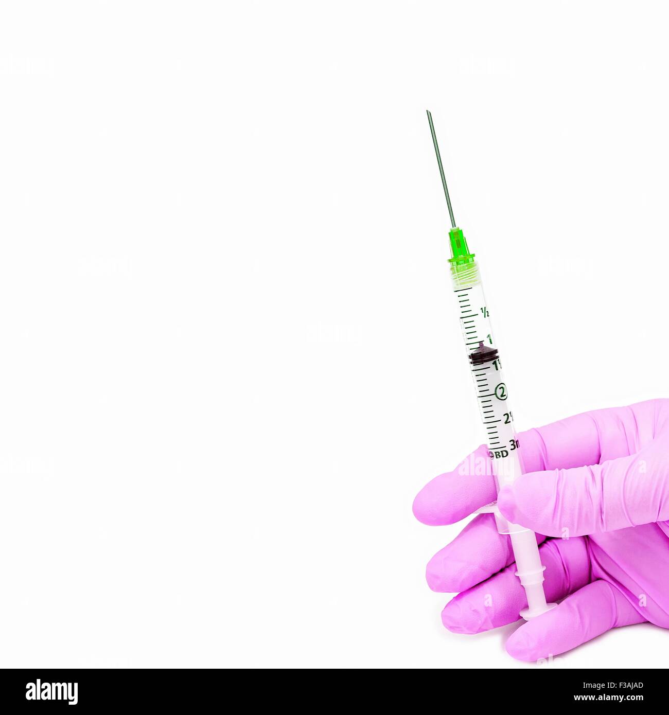 Hand Held 3ml Retracting Syringe Latex Glove Pink Stock Photo Alamy