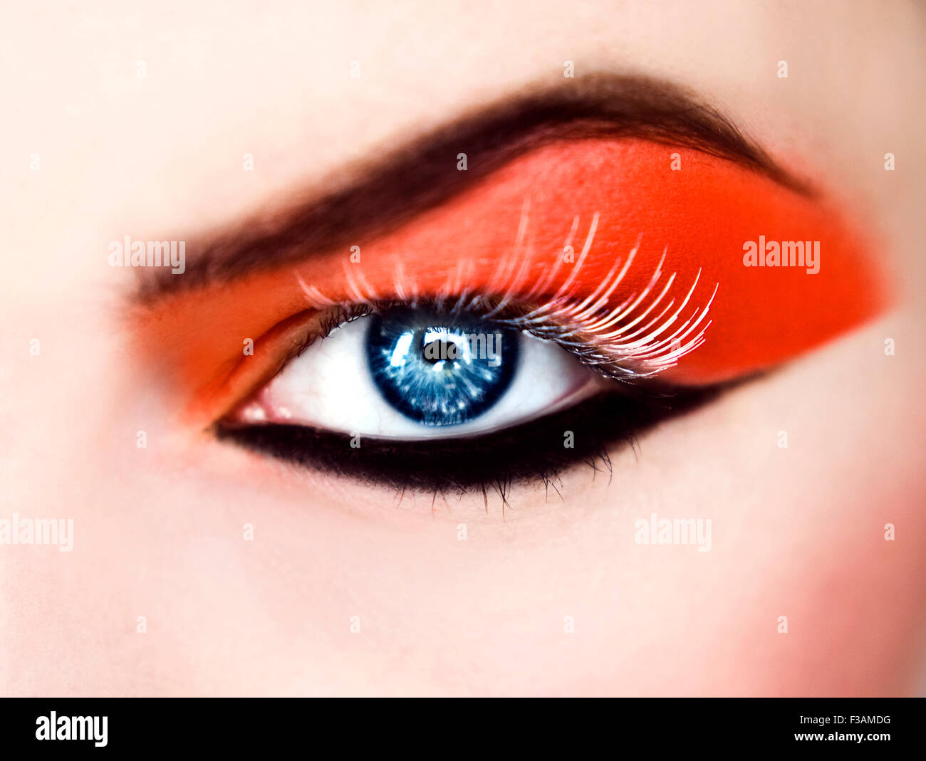Close up of dramatic make up on a blue eye Stock Photo