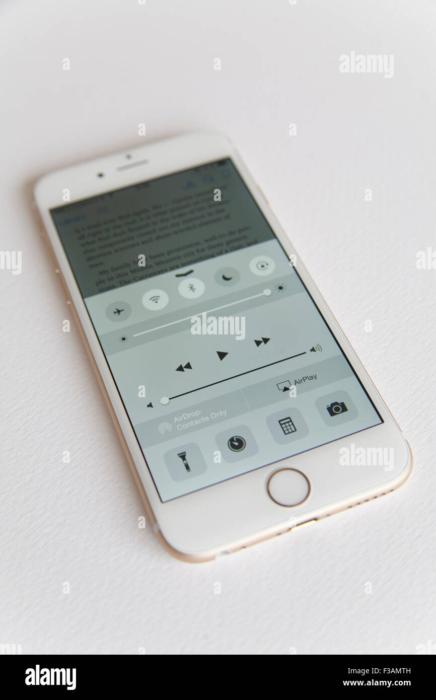 Gold and white Apple iPhone 6 settings screen against a white background Stock Photo