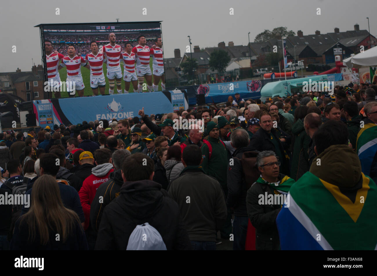 Newcastle upon Tyne, UK. 03 October, 2015. Fans watching world cup rugby on the giant screen in the Rugby World Cup fanzone at Newcastle  Credit:  Colin Edwards/Alamy Live News Stock Photo