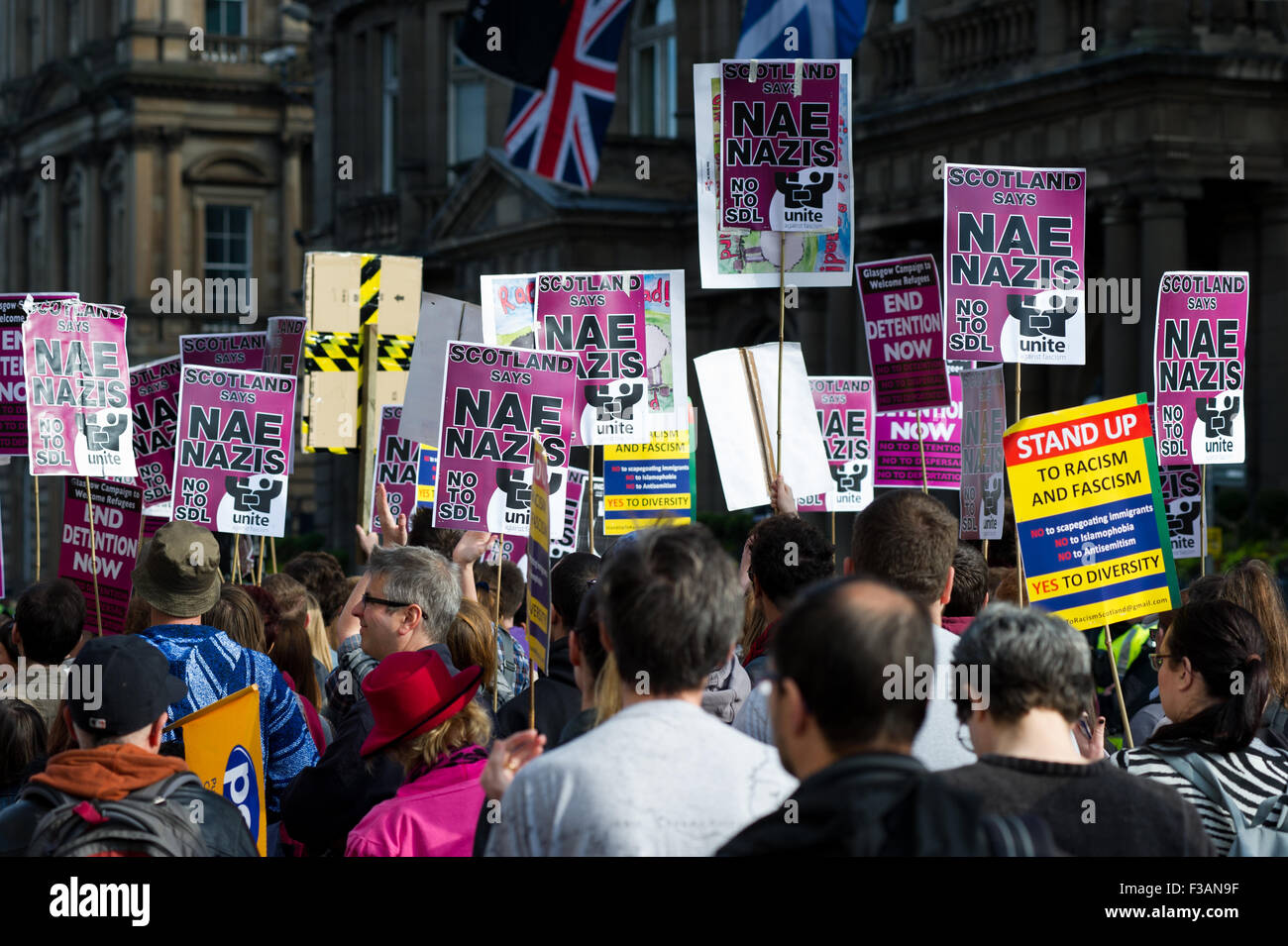 Edinburgh, Scotland 3rd of October 2015. Scottish Defence league held a protest against immigration but were met by a larger counter protest group carrying signs saying 'Nae Nazis'. The SDL protested next to a Duke of Wellington statue where as the other group where held on Princess Street by the police. Credit:  Andrew Steven Graham/Alamy Live News Stock Photo