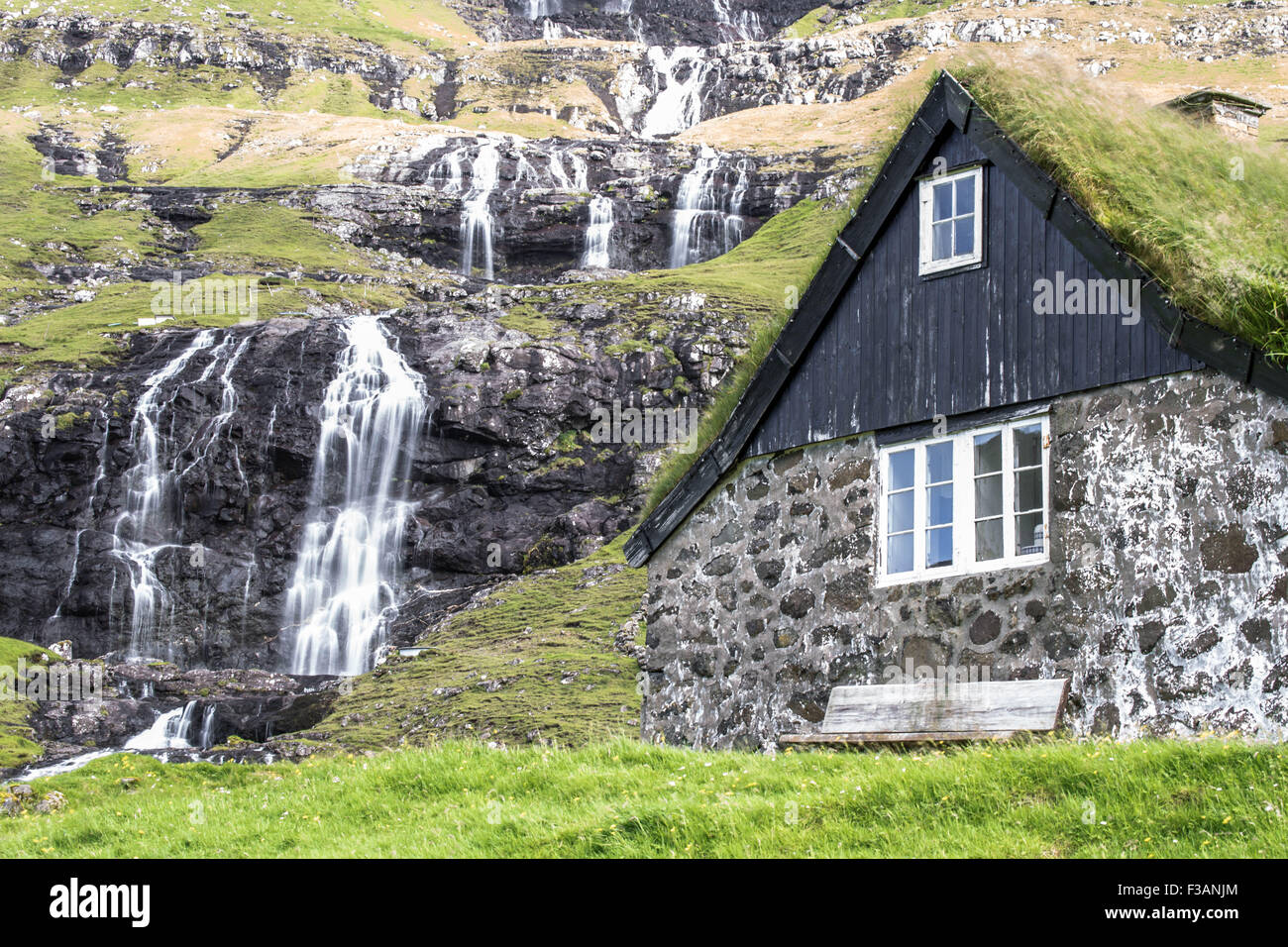 Traditional house with turf roof in Saksun, Faroe Islands Stock Photo