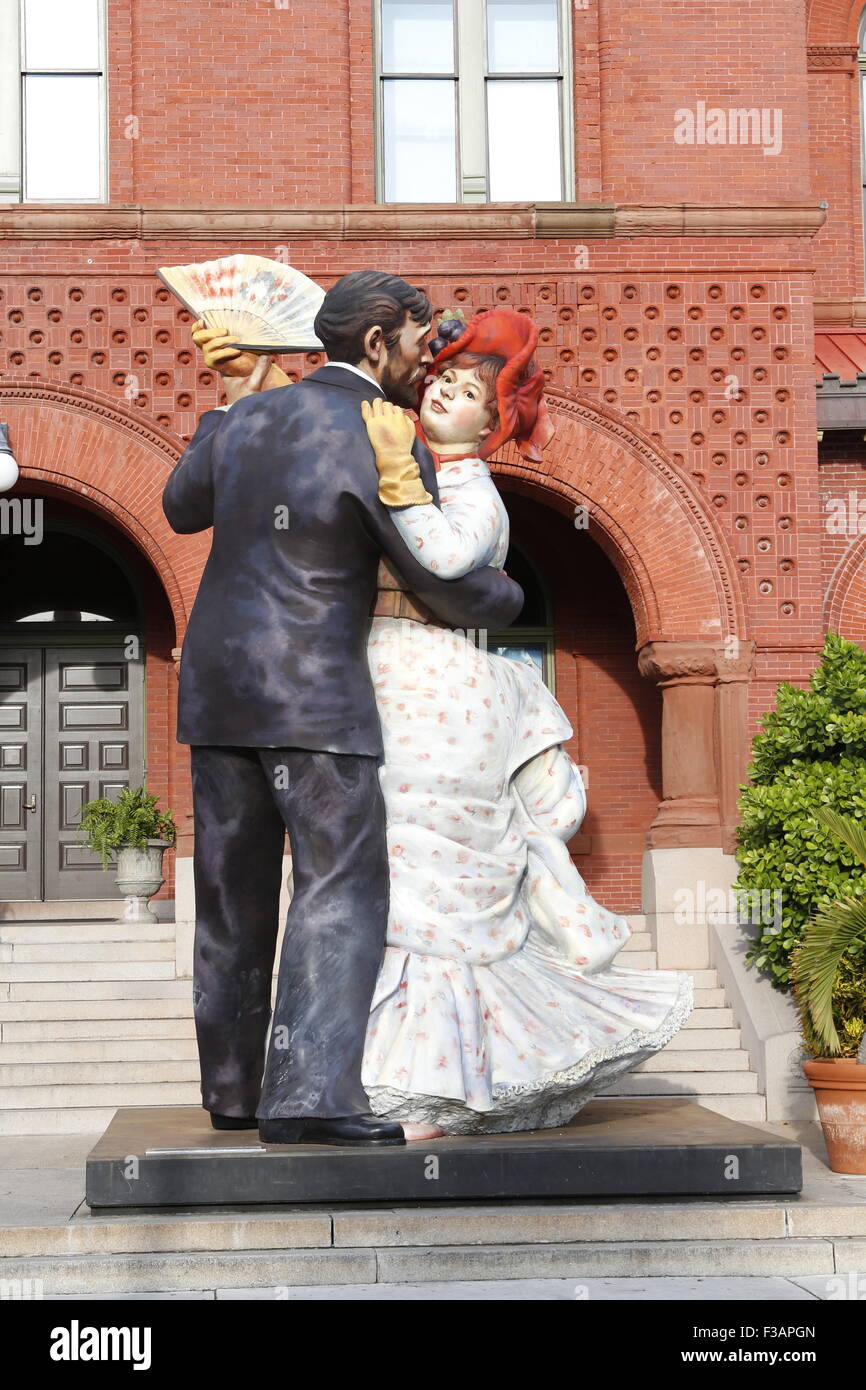 A large sculpture, 'Time For Fun' by Seward Johnson, in front of the Key West Art and Historical Society Museum in the historic Stock Photo