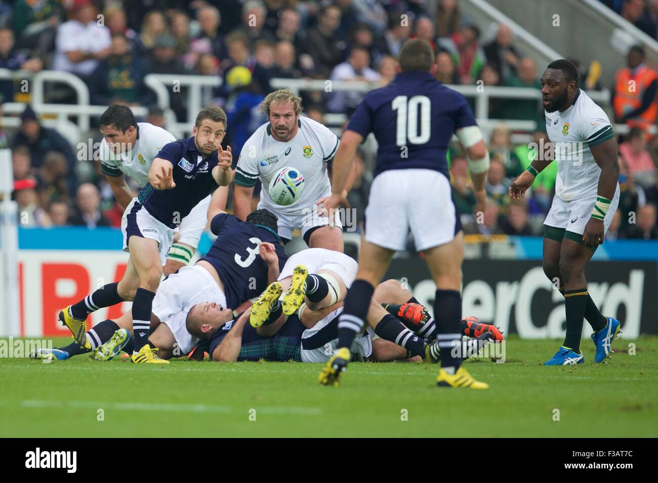 St James Park, Newcastle, UK. 03rd Oct, 2015. Rugby World Cup. South Africa versus Scotland. Scotland scrum-half Greig Laidlaw passes the ball to Scotland fly-half Duncan Weir. © Action Plus Sports/Alamy Live News Stock Photo