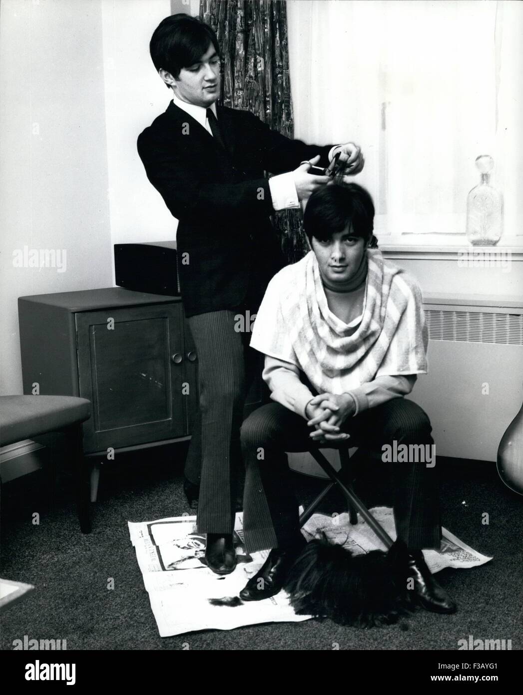 Dec. 21, 1965 - They like to cut each other hair. The singing Ryan Twins all set to cut a new disc too Paul and Barry Ryan, the 17-year-oldl twin sons of singer Marion Ryan, have been notching up quite a few hits, starting with their first disc Bring Me Your HeartachesÃ and are currently in the process of cutting a new disc which is going to be very different. So different in fact that the twins manager thought it was time they looked different too, from all the other long-haired pop stars and suggested a haircut. Now if thereÃ one thing the twins don ike its someone having a go at their love Stock Photo